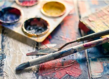 Paint pots, paintbrush, and paint spatula