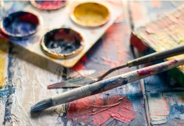 Paint pots, paintbrush, and paint spatula