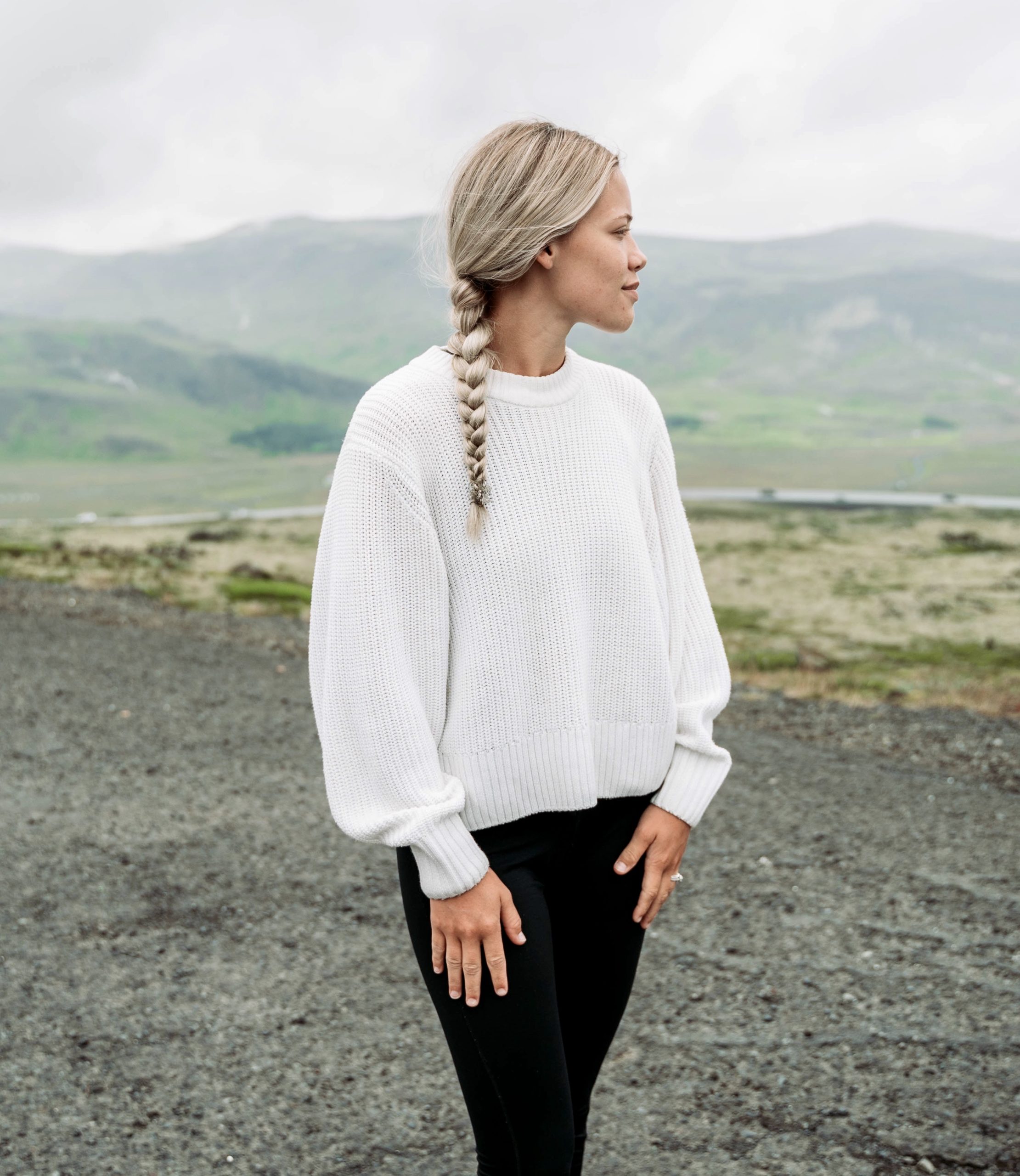 Woman looking at mountains, making resolutions for her New Year